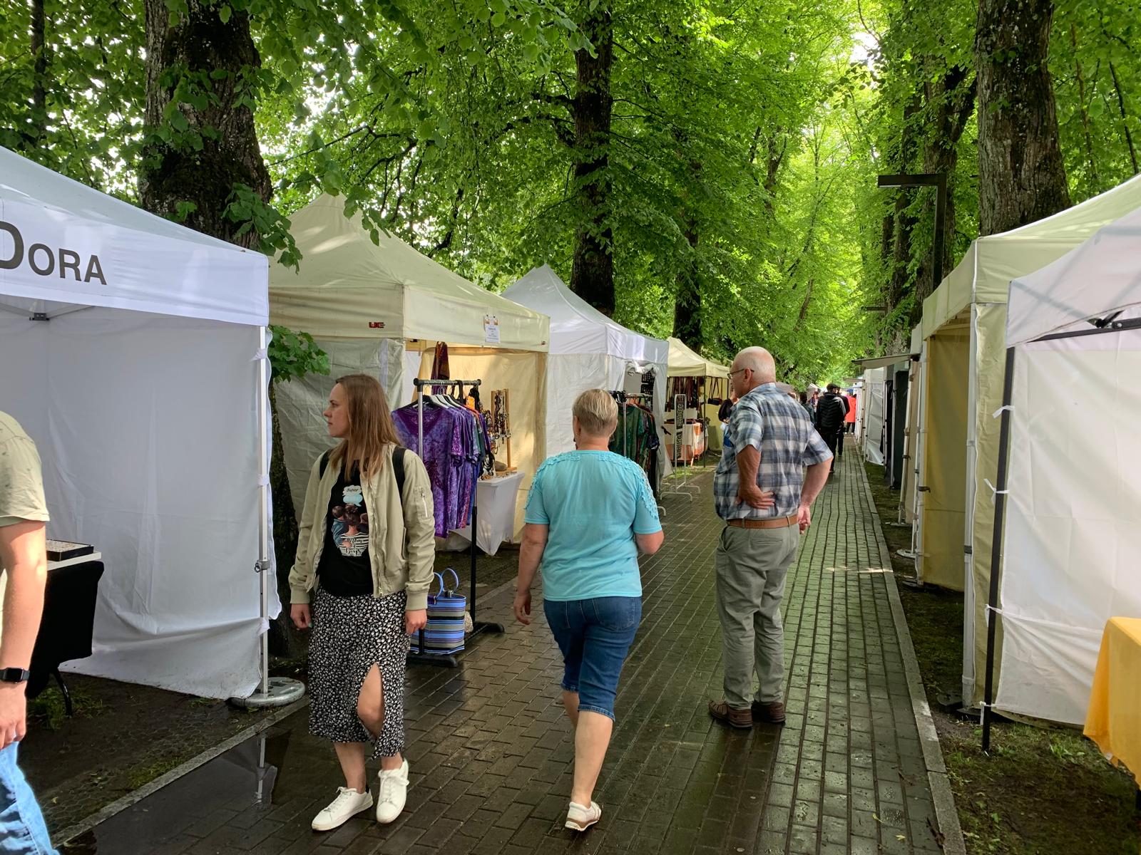 Market avenue with stalls and visitors at Pärnu Hansapäevad