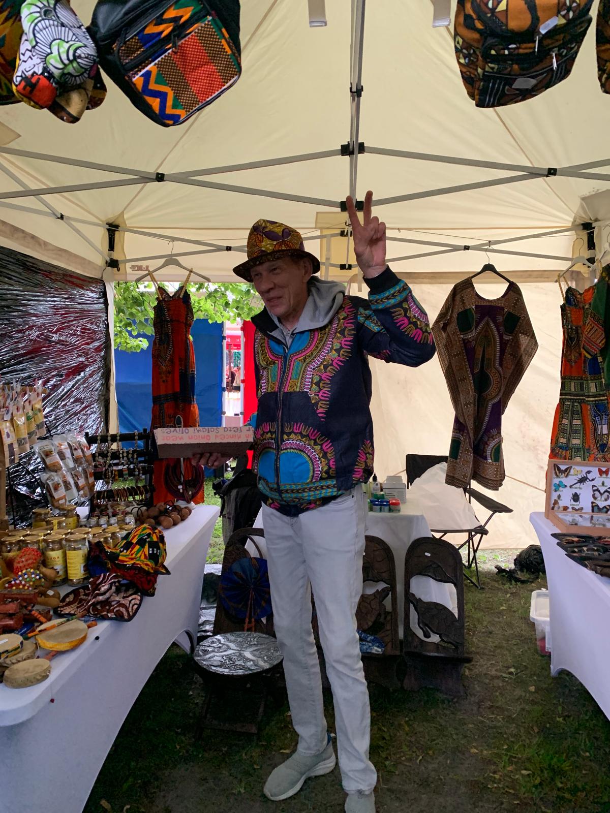 TogoSunny host greeting visitors at the stand