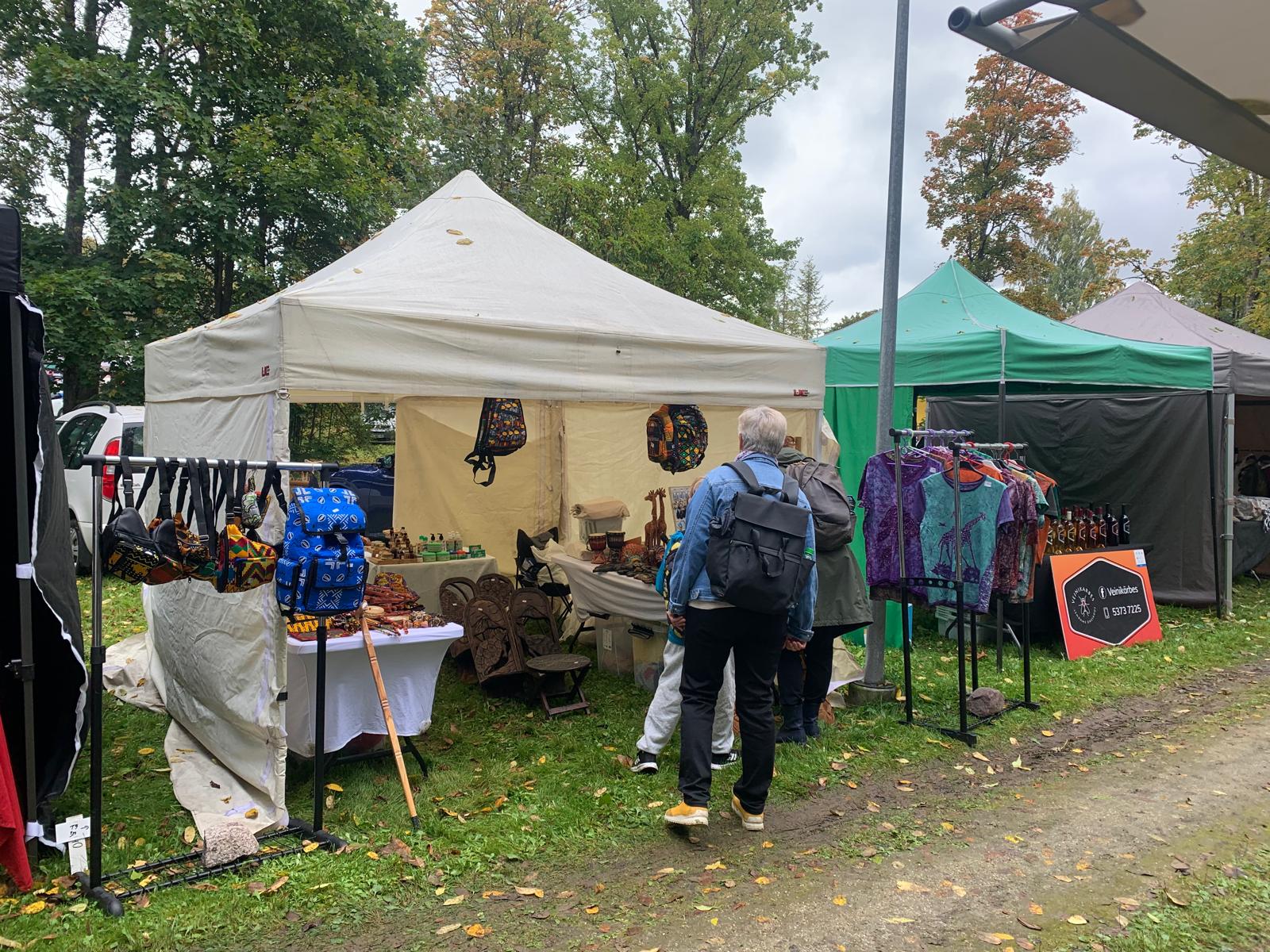 Visitors browsing the TogoSunny tent at Suur Paunvere