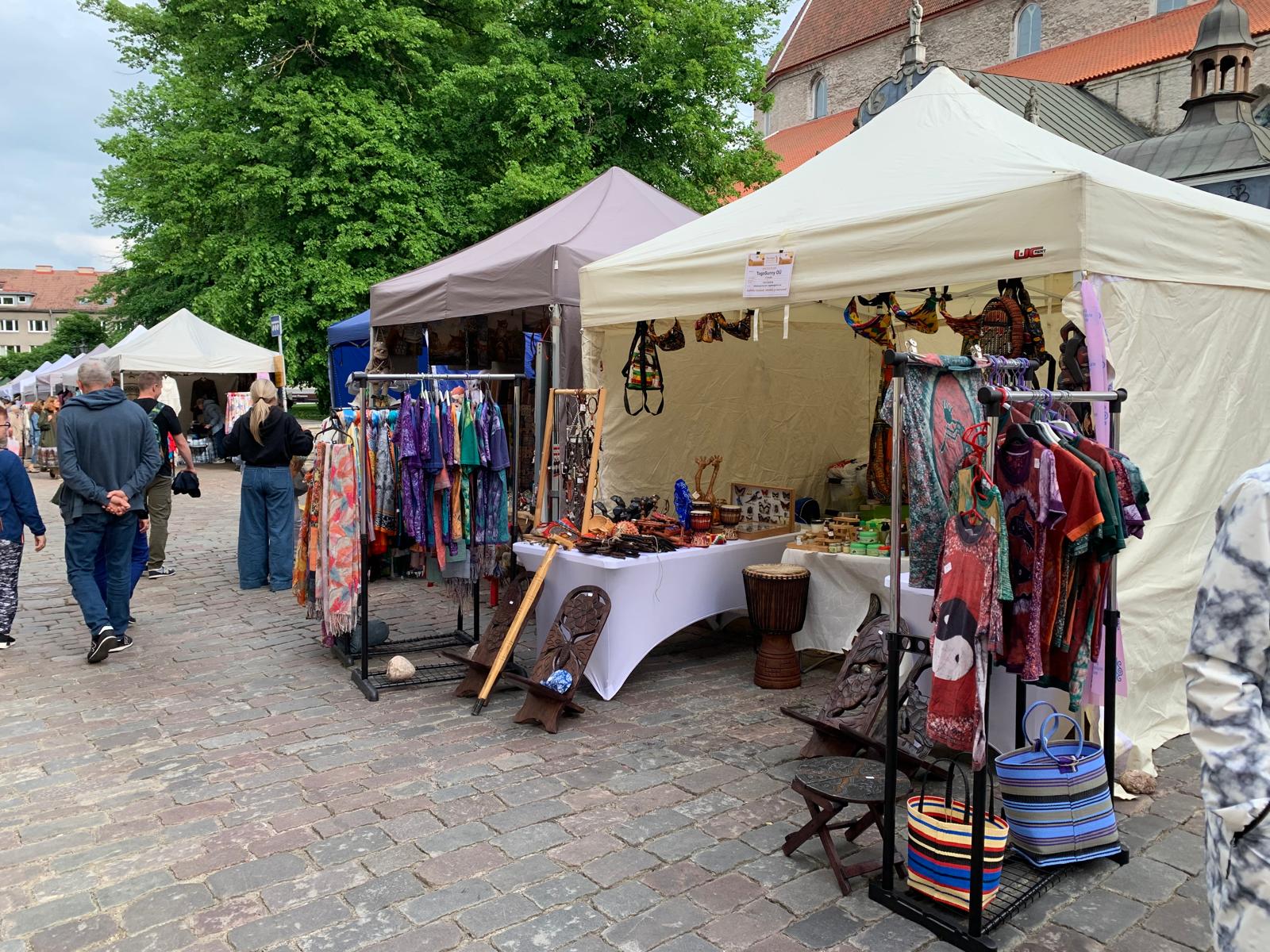 Batik shirts, jewellery and dashiki dresses inside the TogoSunny tent